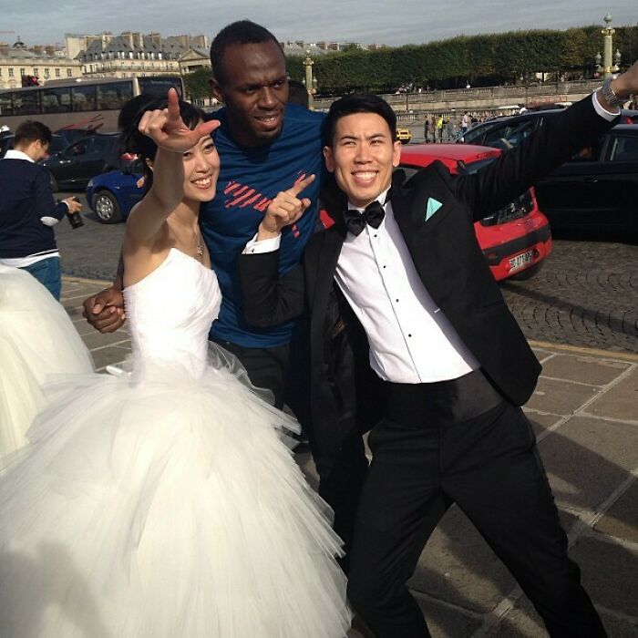 In 2013, Usain Bolt Photobombed A Couple Who Were Taking Their Wedding Photos In Paris