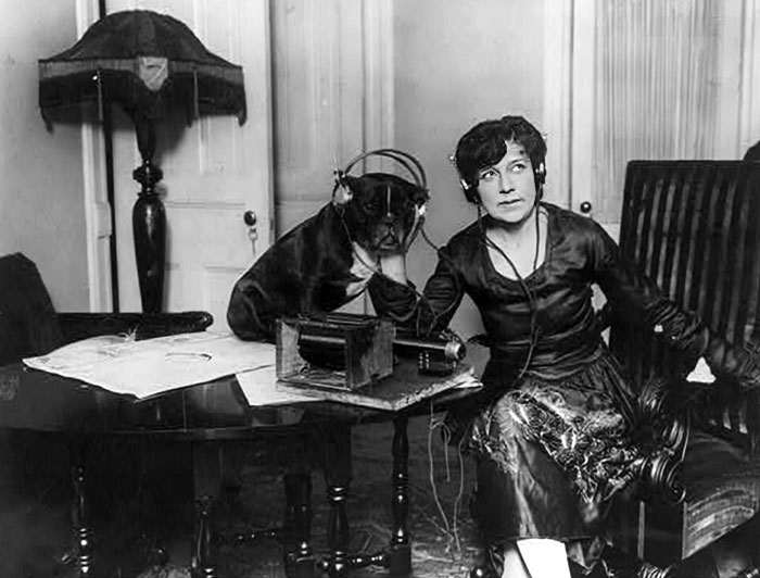 Madame Asta Souvrina And Her Dog Listening To The Radio 