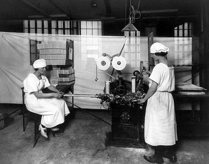 2 Women Operating Gum-Wrapping Machine At The American Chicle Company Plant