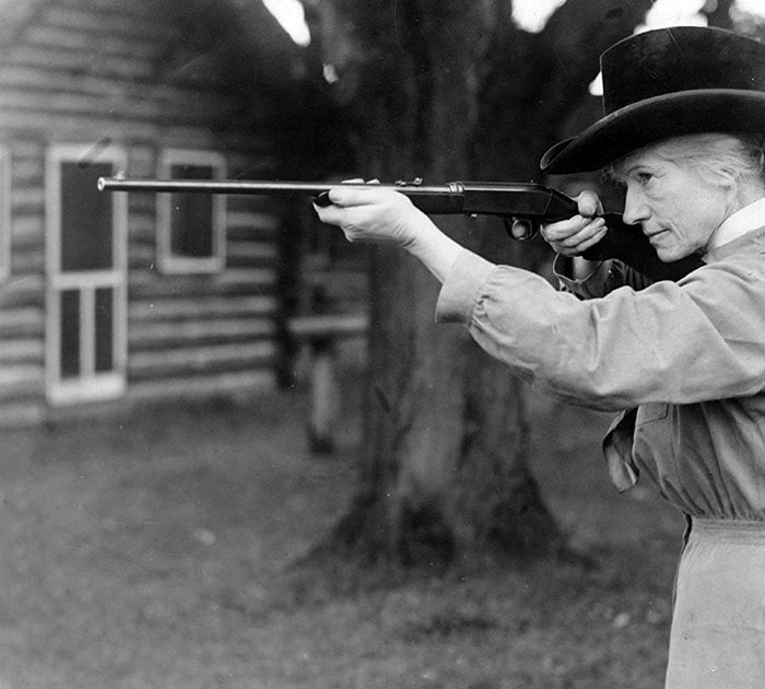 Phoebe Ann Moses Butler, Also Known As Annie Oakley, Aiming A Rifle In 1922
