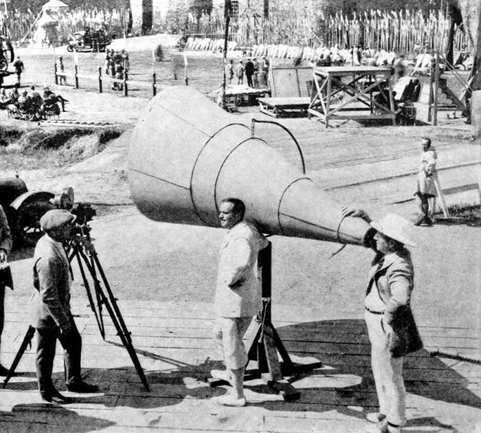 Allan Dwan Is Making Himself Heard By Twelve Hundred Extras Through The Medium Of The World's Largest Megaphone. Four Feet In Diameter And Ten Feet Long