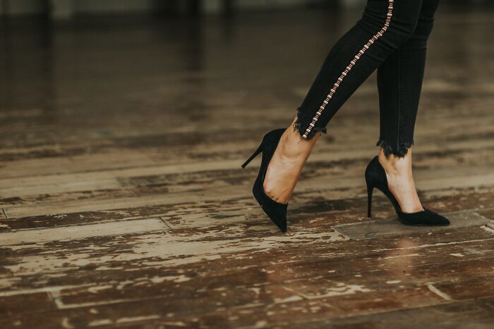 Woman With High Heels On Floor 
