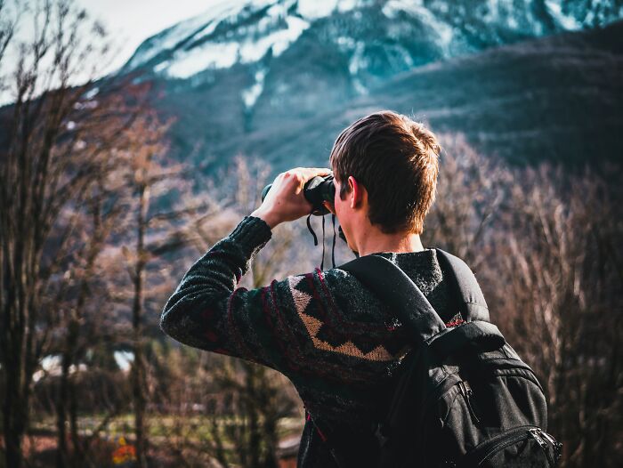 Man Looking Through Binoculars 