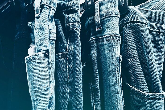 Multiple Pairs Of Blue Jeans 