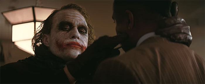 Joker asking "Why so serious?"