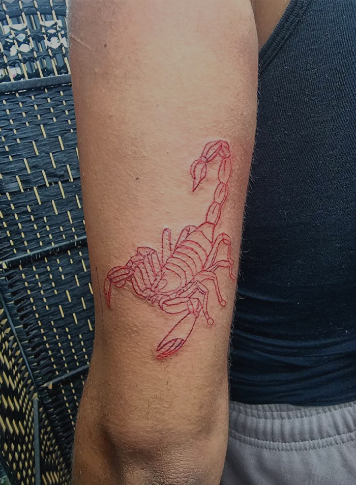 Red Ink Scorpio Tattoo
