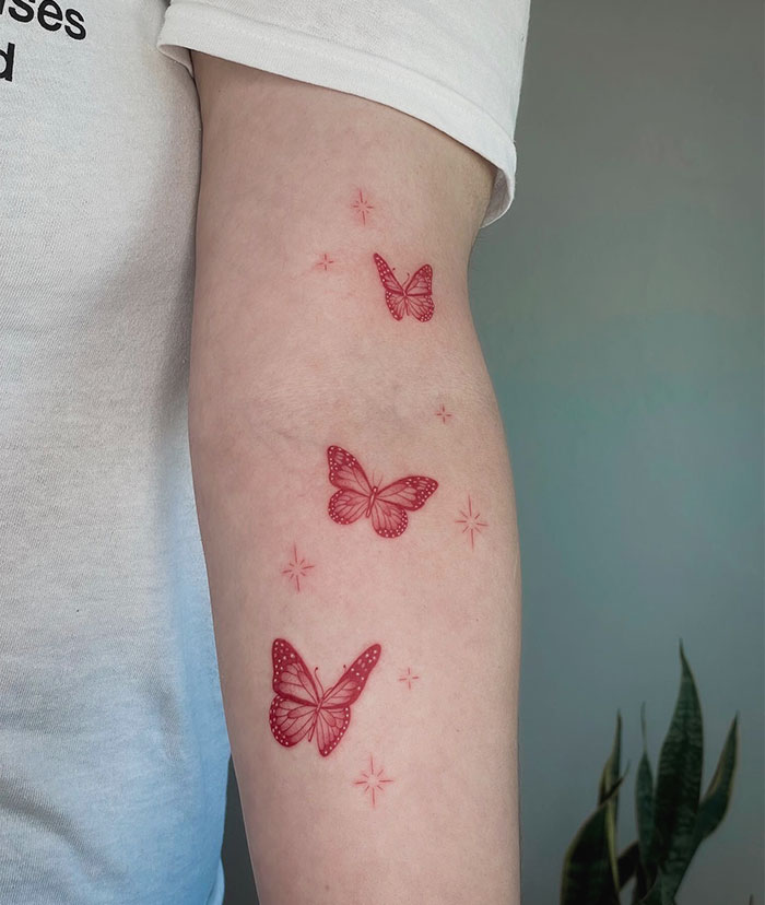 Red Ink Butterfly Tattoo
