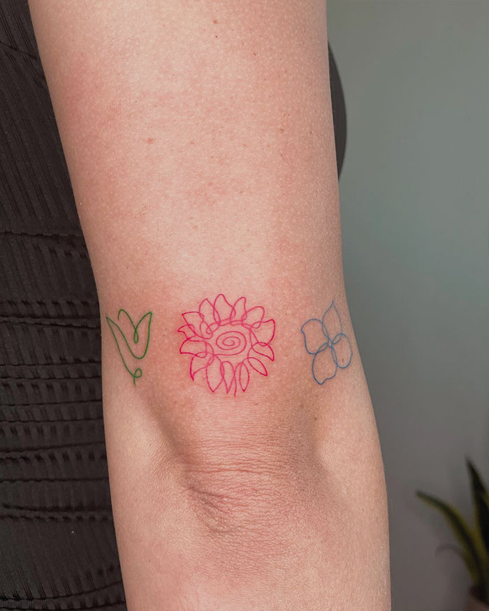Red Ink Flowers Tattoo
