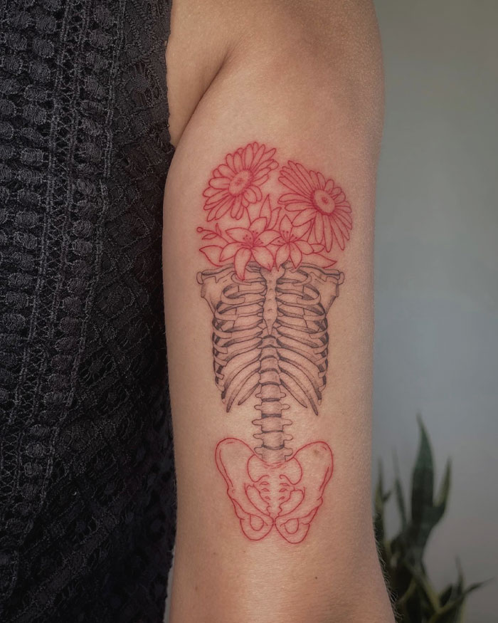 Woman Skeleton With Flowers