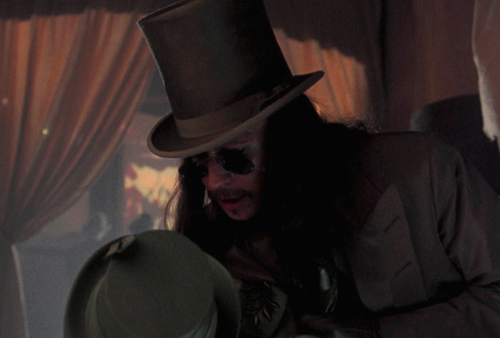 Count Dracula wearing sunglasses and hat 