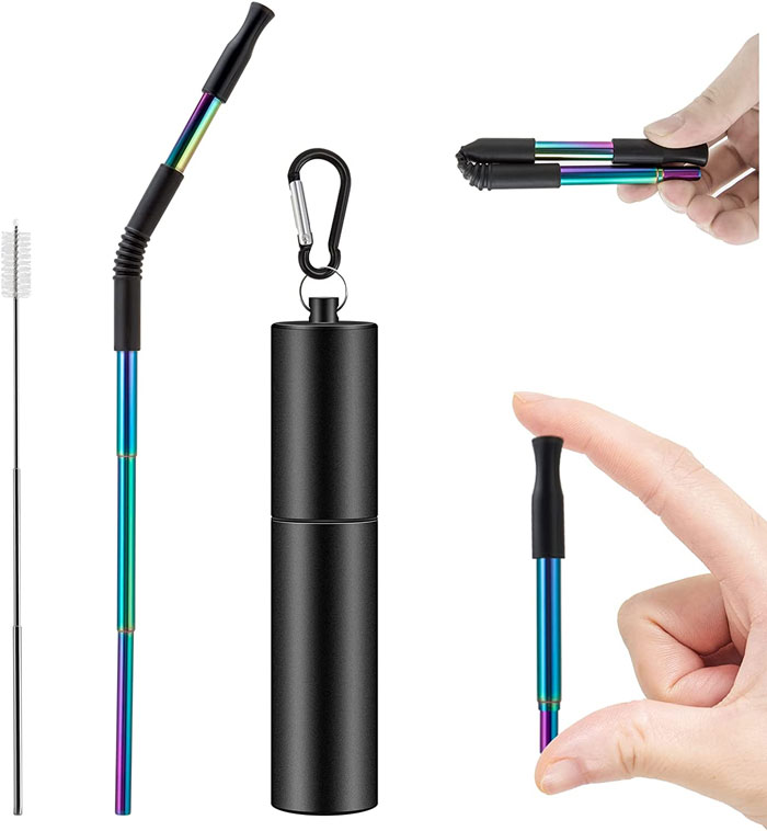 Person holding metal straw 
