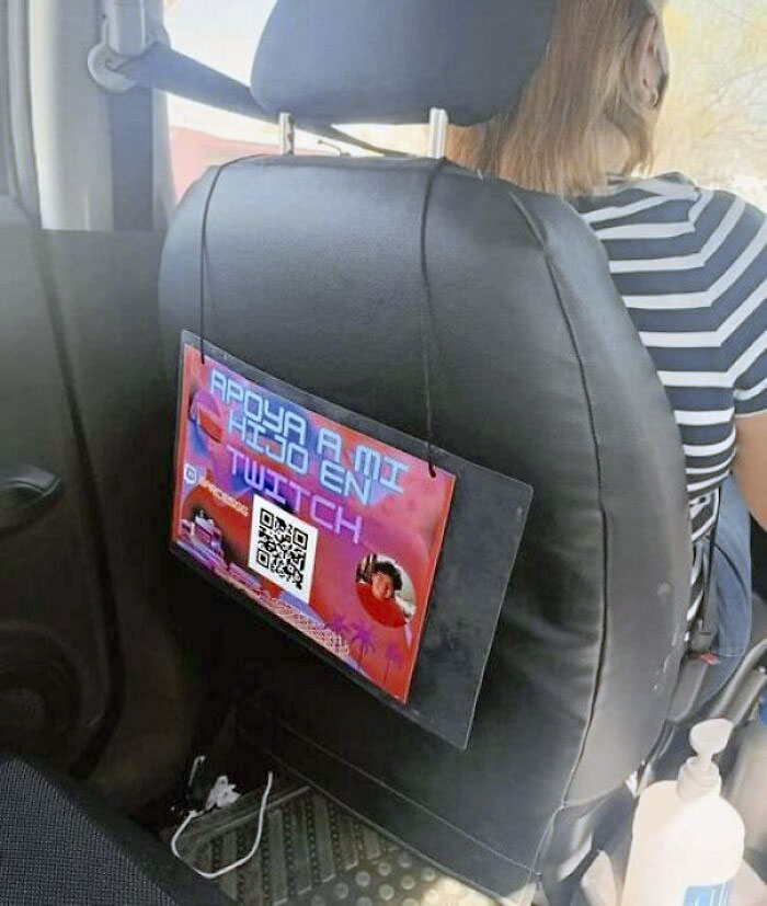 A Proud Taxi Driver Mom Has A Sign For Her Customers To Subscribe To Her Son's Twitch Channel