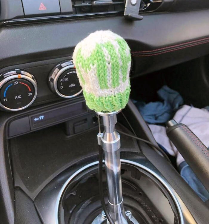 My Mom Knitted A Little Beanie For My CAE Shifter Because It Gets Hot In The Sun. It Has "Miata" On It