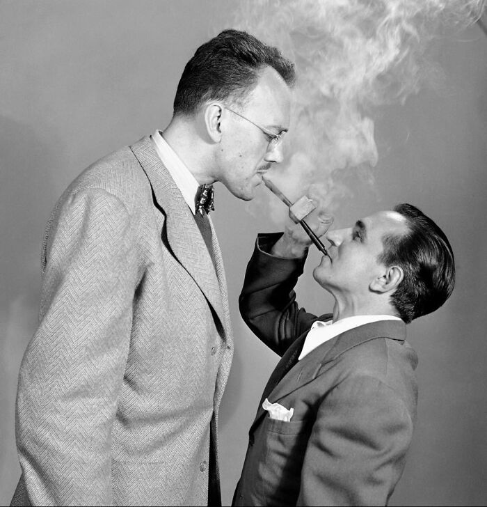 Two Men Demonstrate A Pipe Called The “Double Ender” In New York, 1949