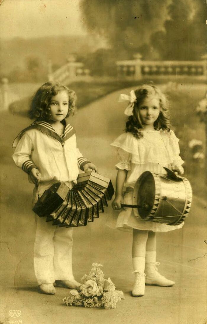 2 Young Girls Playing Music