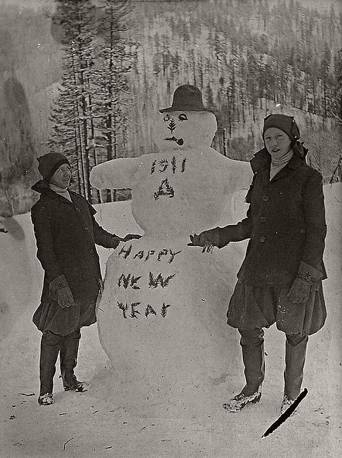Two Children With A Snowman Greeting The New Year 1911