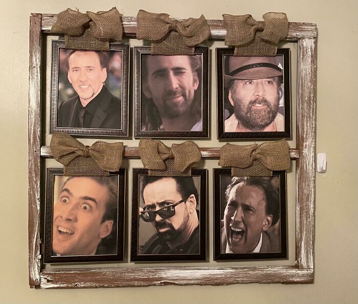 Nicolas Cage portrait hanging on the wall 