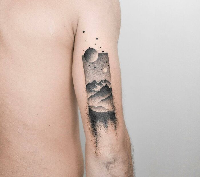 Mountain and sun arm tattoo 