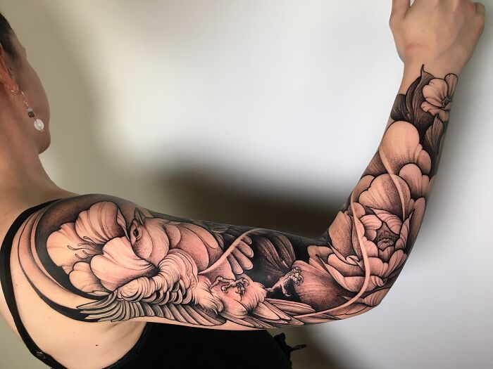 Full hand sleeve bird and flower tattoo