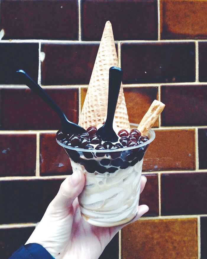 Ice cream with cone in the cup field with bubbles 