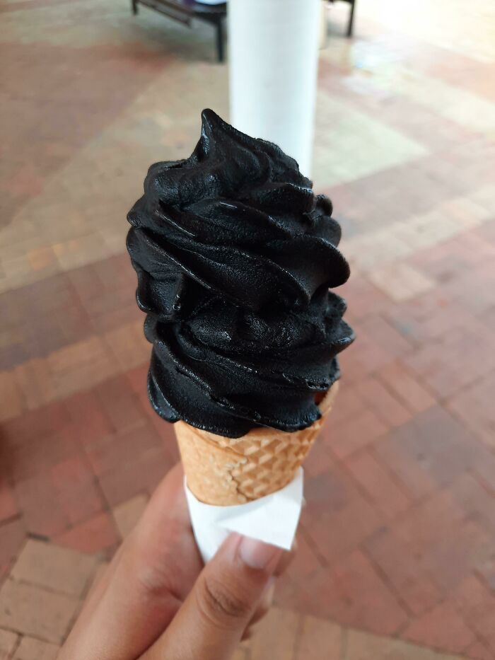 Black ice cream in the cone 