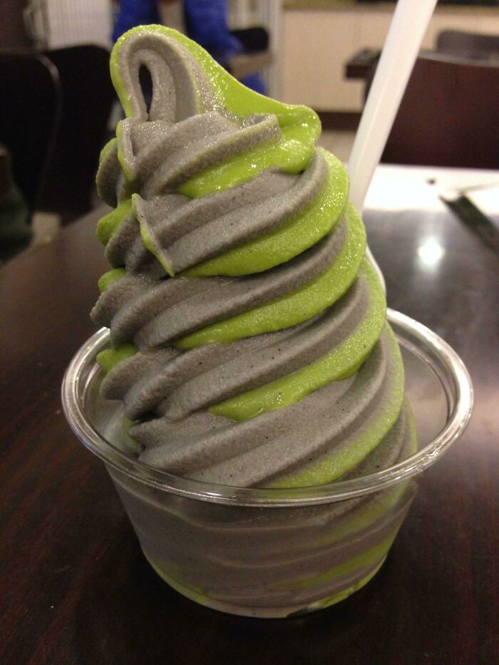 Grey and green ice cream in the cup 