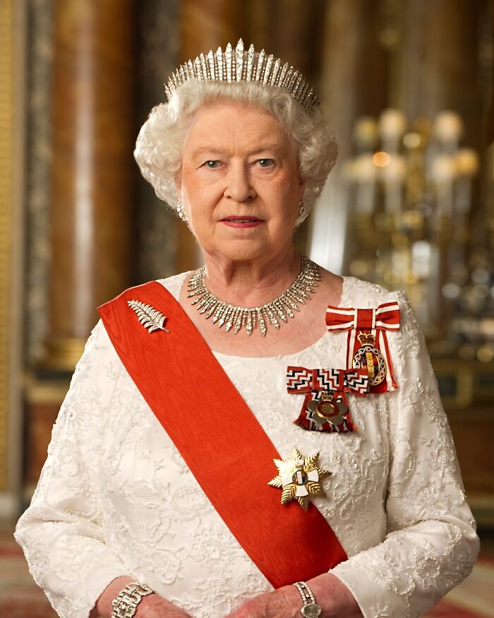 Queen Elizabeth II posing for a picture 