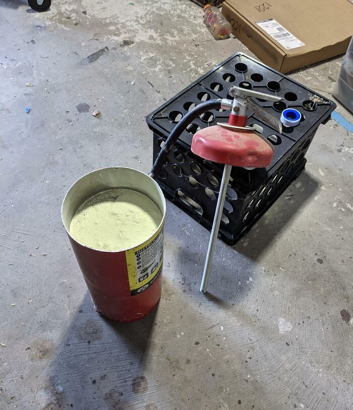 Cut The Top Of An Old Fire Extinguisher