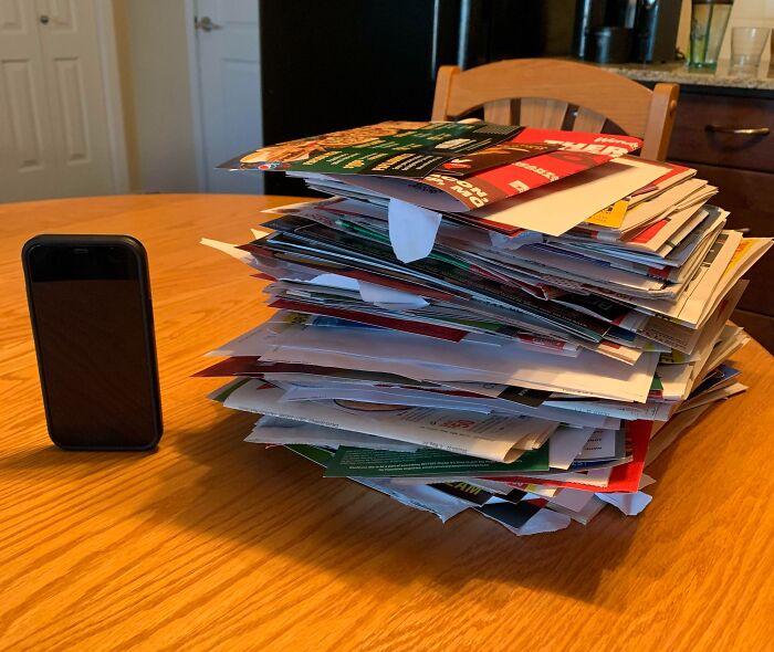 I Saved All My Junk Mail For A Year. iPhone For Scale
