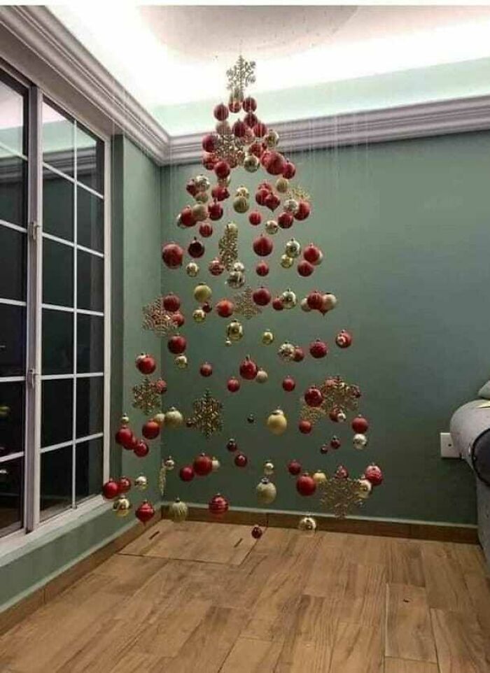Hanging Christmas Tree Ornaments In The Shape Of A Christmas Tree