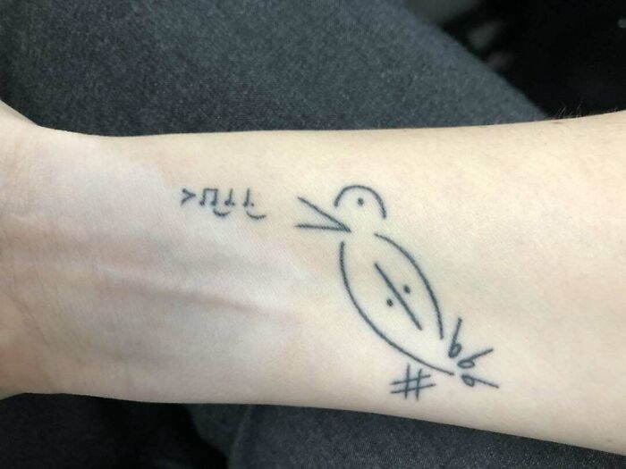 Minimal musical symbols bird tattoo