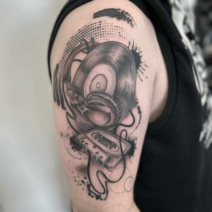 Tattoo with vinyl, headphones and cassette