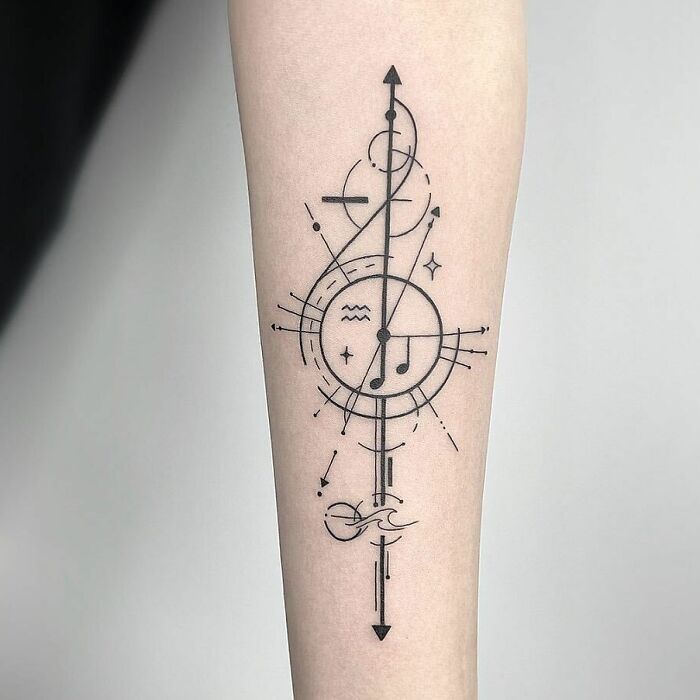 Black geometric tattoo with music note