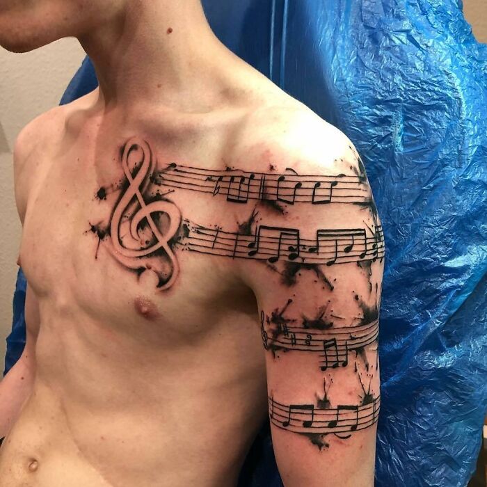 Black musical notes tattoo