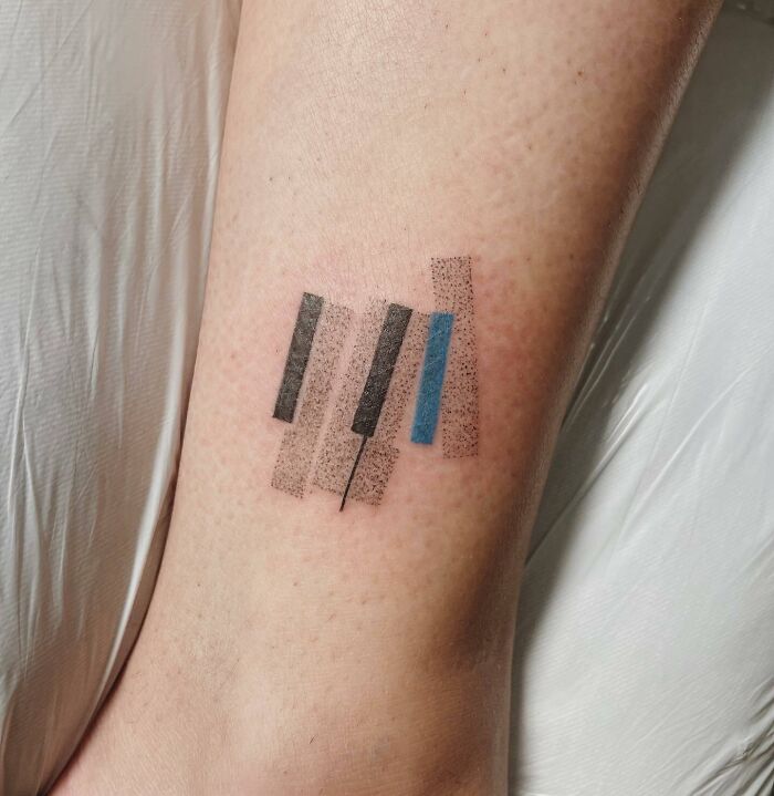 Abstract piano keys tattoo
