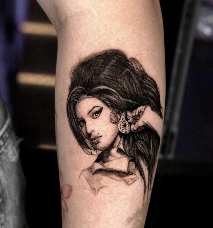 Realistic Amy Winehouse tattoo