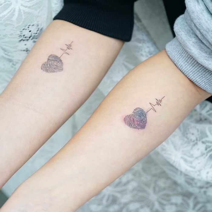Heart matching arm Tattoo