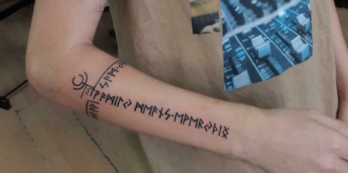 Forearm quote tattoo