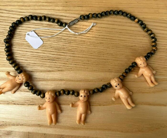 Perfect Gift For Someone. Not Sure Who. But Someone Will Appreciate A Necklace Of Tiny Plastic Babies