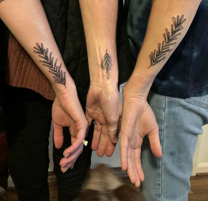 Rosemary matching family arm tattoos