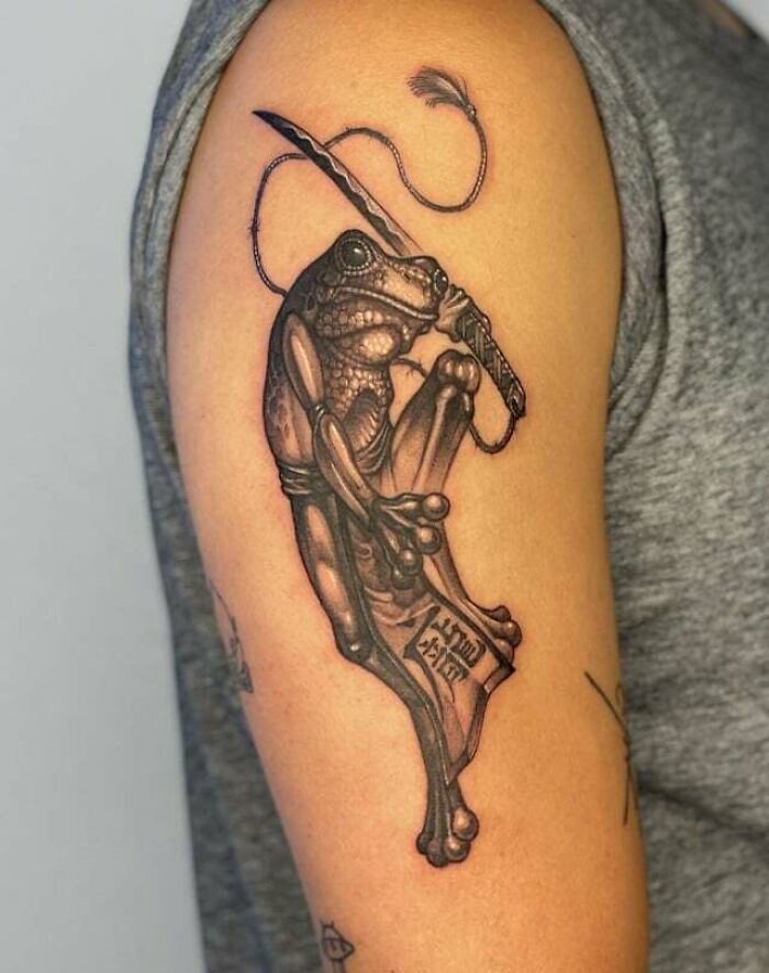 Samurai from with family name arm tattoo