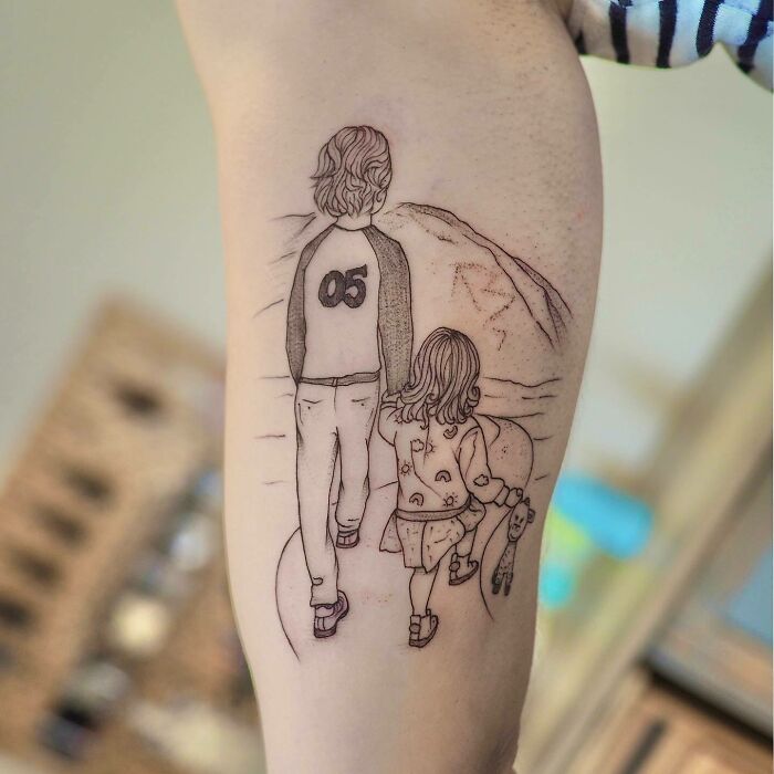 Cute family walking line arm tattoo