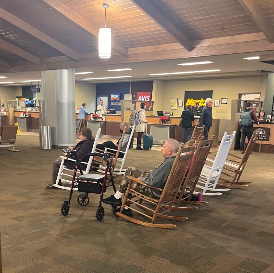 Airport Has A Section Of Rocking Chairs In Baggage Claim