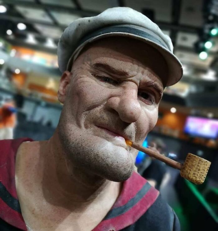 Person cosplaying Popeye