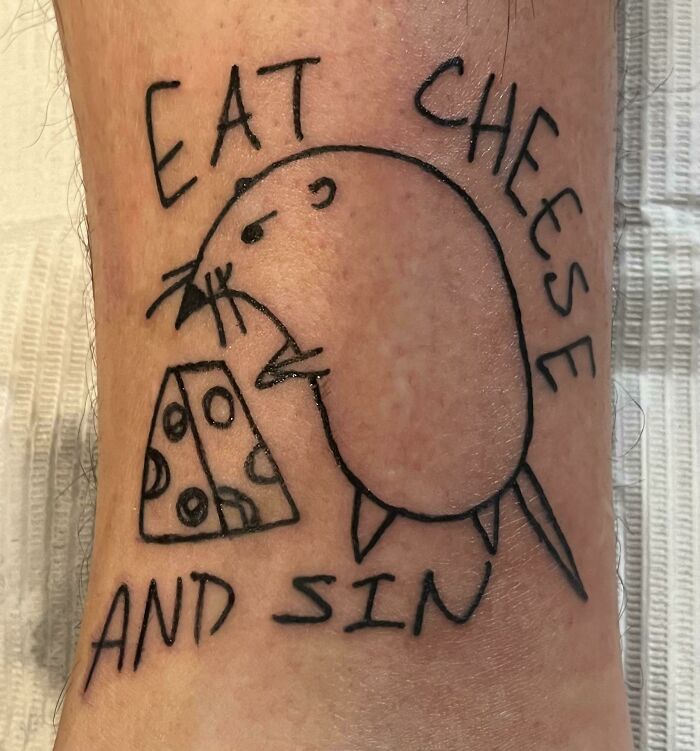 Mouse with cheese tattoo, featuring playful text, showcasing creative food ink-spiration.