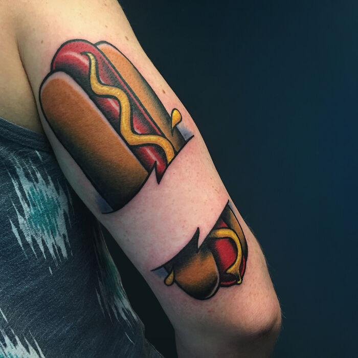 Hot dog watercolor arm tattoo