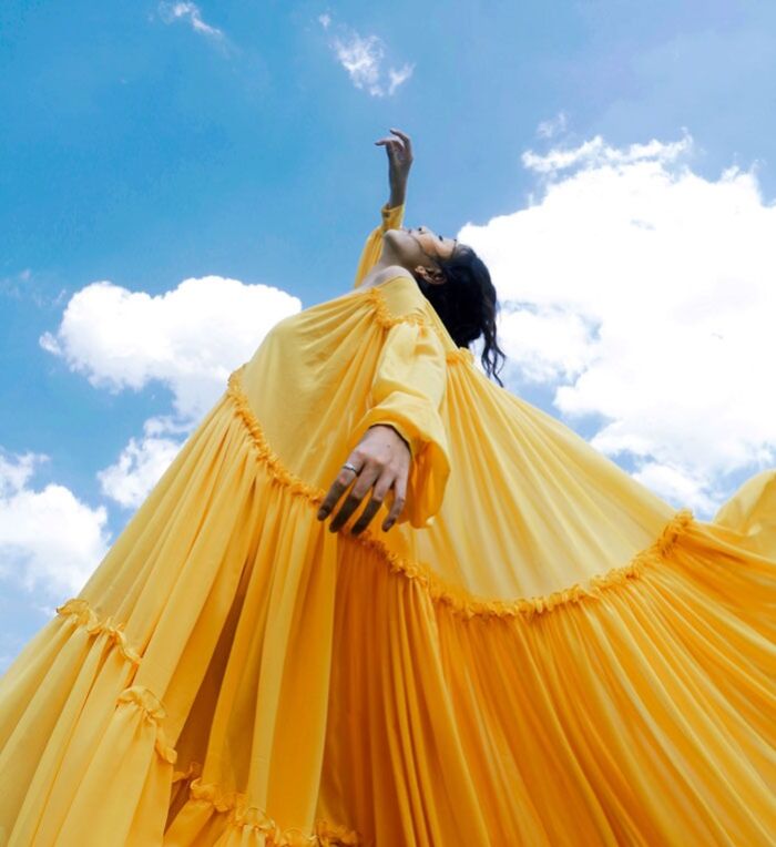 Woman wearing yellow dress