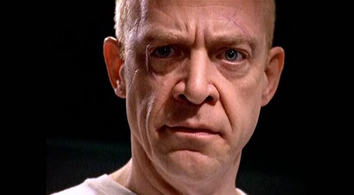 Angry man looking down 