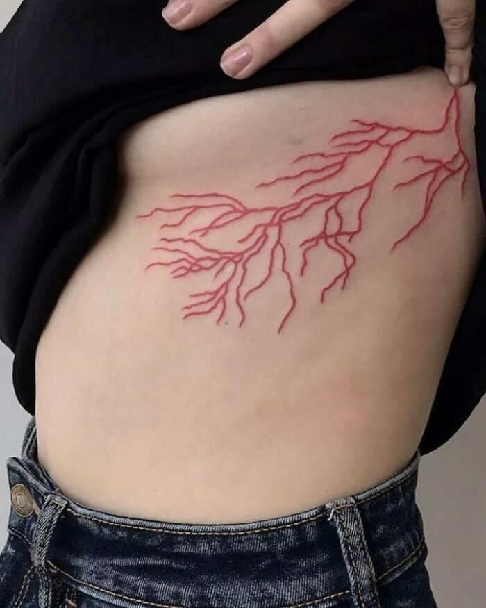 Red Ink Lightning Tattoo
