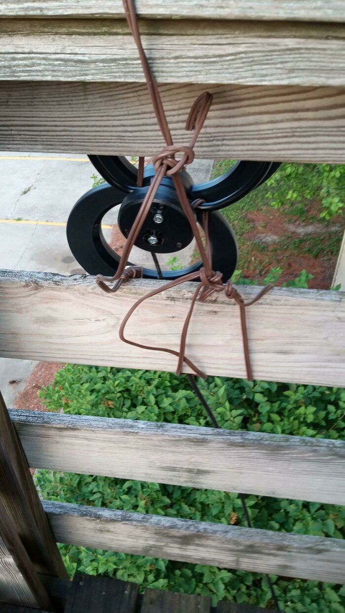 My Downstairs Neighbor Tied Their TV Antenna To My Deck Railing With A Cut Cord For Better Reception